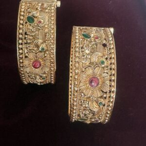 Intricate Nakshi-style floral filigree work